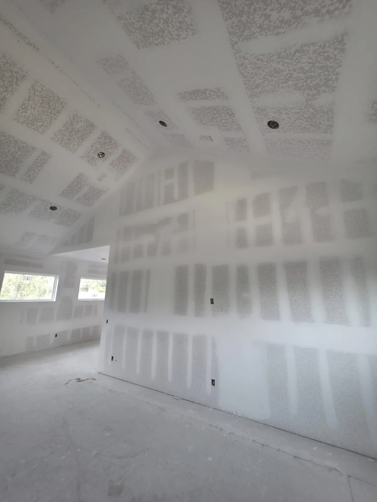 Drywall finishing and texture work in a residential interior in Central Florida