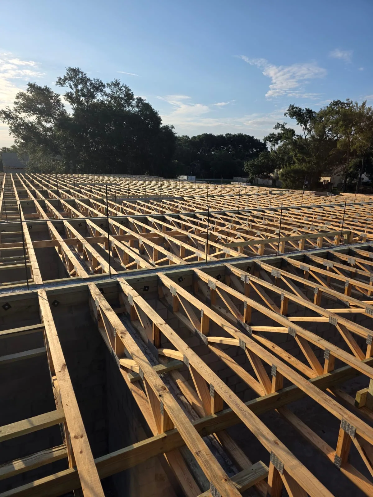 Large-scale wood floor framing system under construction in Central Florida