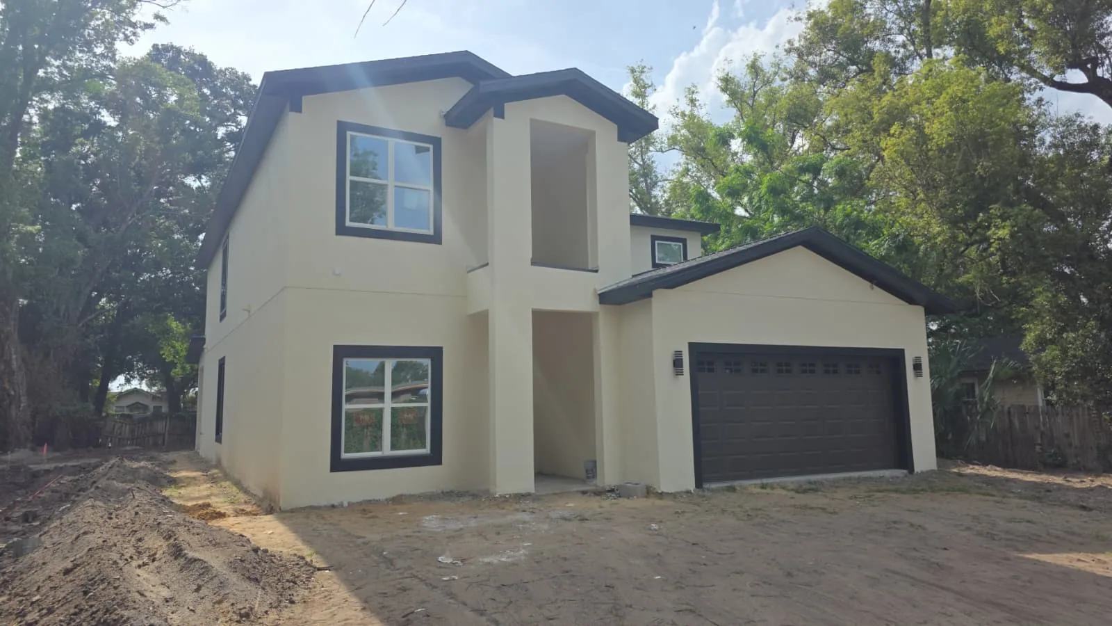 Completed stucco exterior on a two-story residential construction project in Central Florida